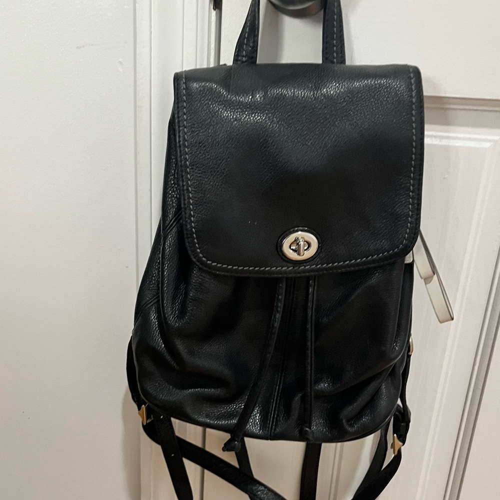 Coach small black pebble leather backpack